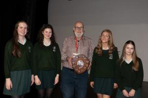 The team from Greenbank are presented with the winners shield by President David Taylor.